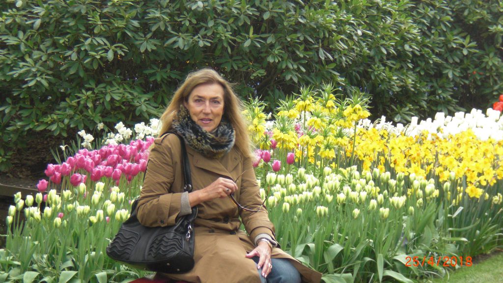 sitting in the flowers