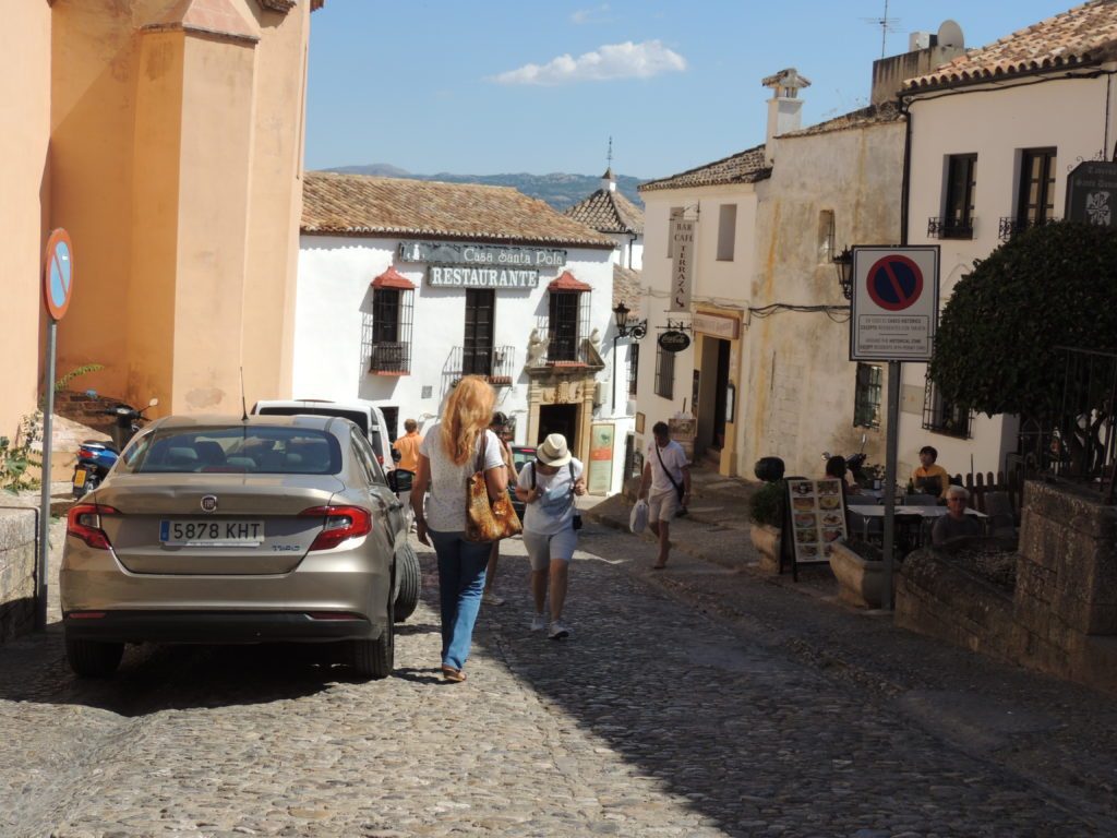 Walking down the cobblestone street