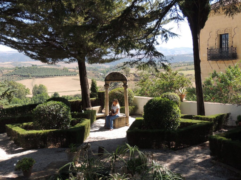 Sitting in the garden of the Casa del Rey Moro
